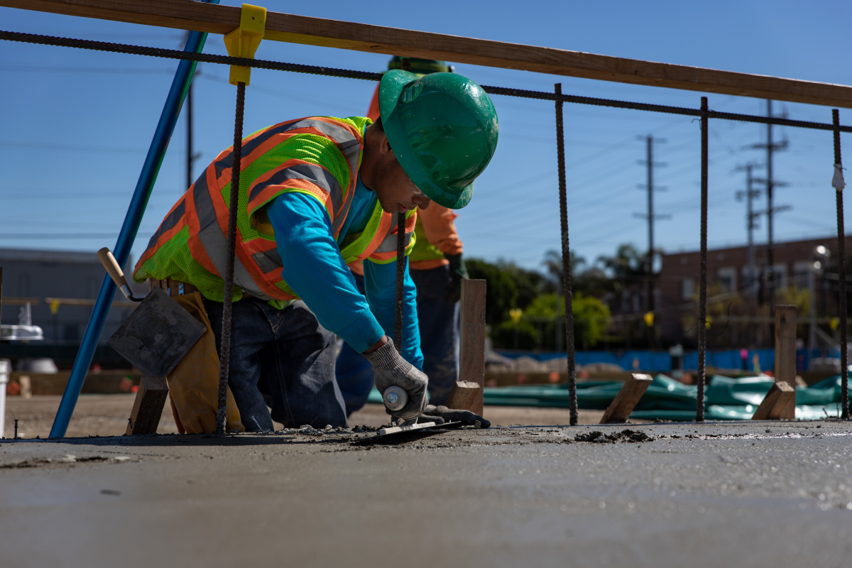 Concrete is finished following the first slab on grade pour at the Maintenance and Storage facility