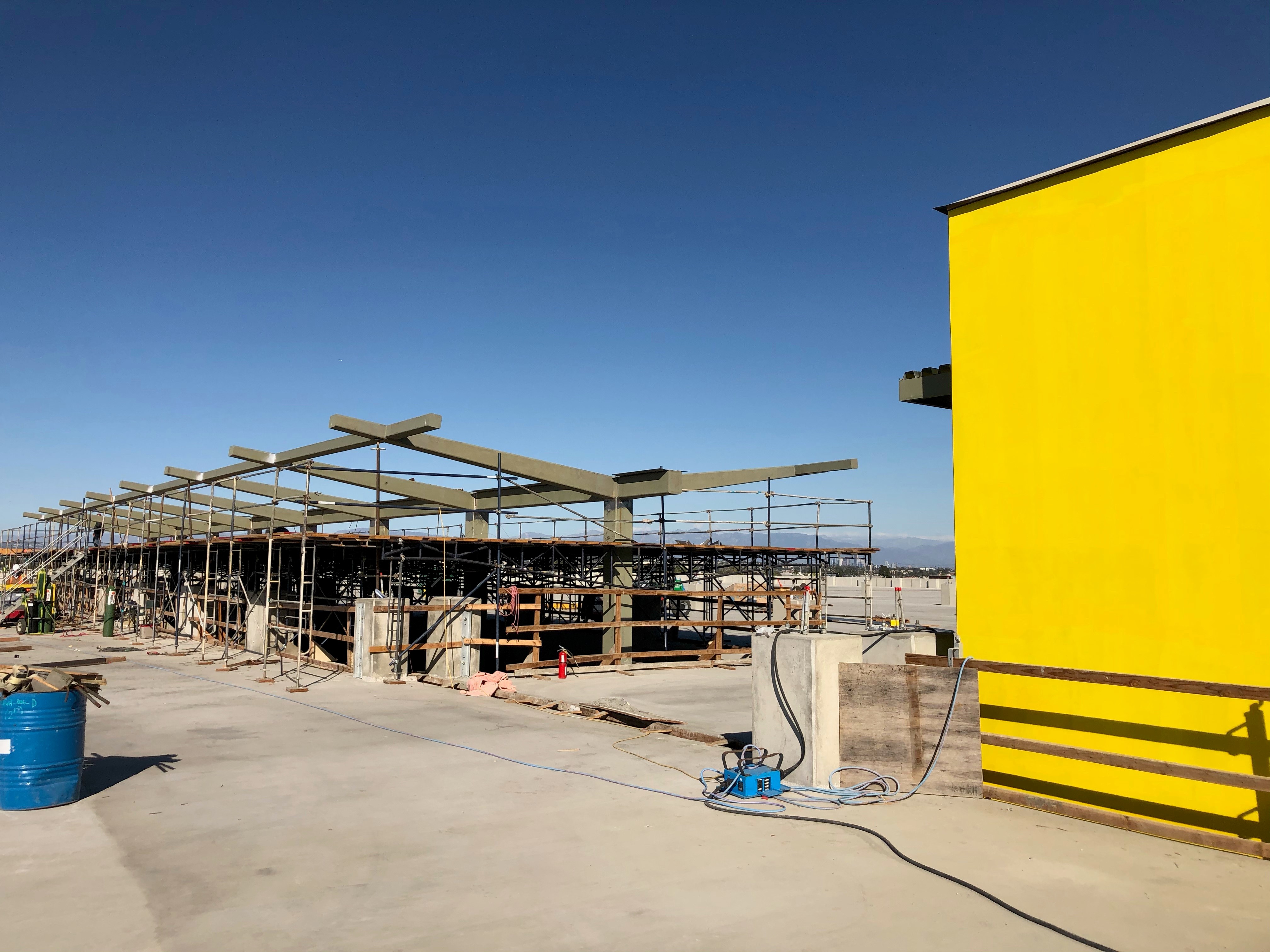 Installation of the escalator canopy on the roof of the Intermodal Transportation Facility-West.