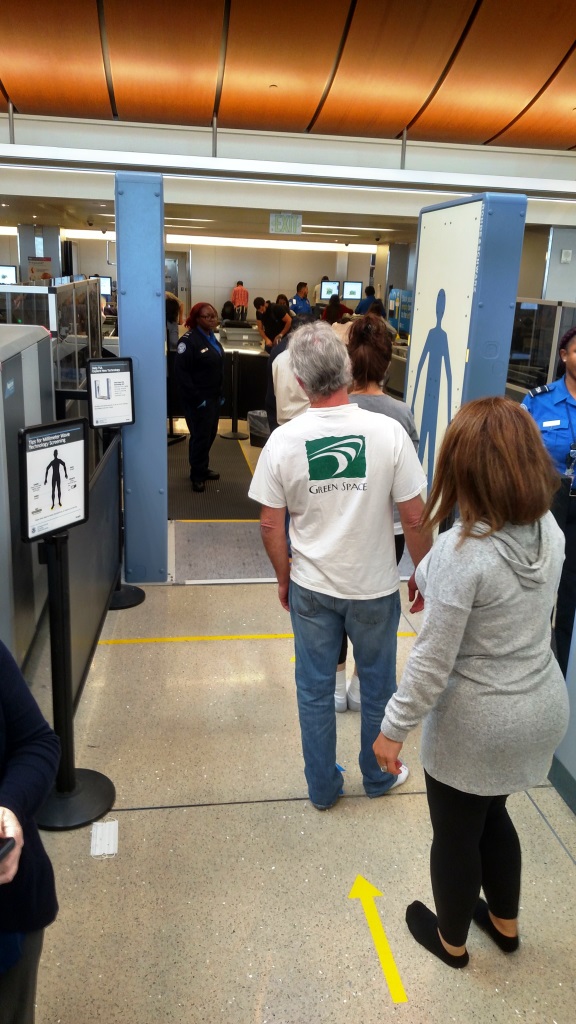 Image of passengers in line waiting to through the Advanced Imaging Technology unit at the Tom Bradley International Terminal's security screening check point. 