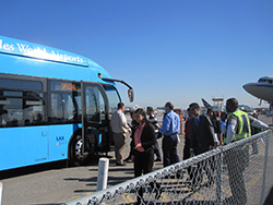 Students getting off LAX shuttle bus.