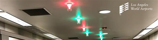 Image of ceiling with new Tooshlights lights, showing 4 greens lights and two red lights.