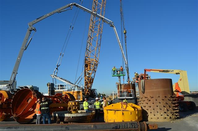 concrete is pumped in to fill the hole.