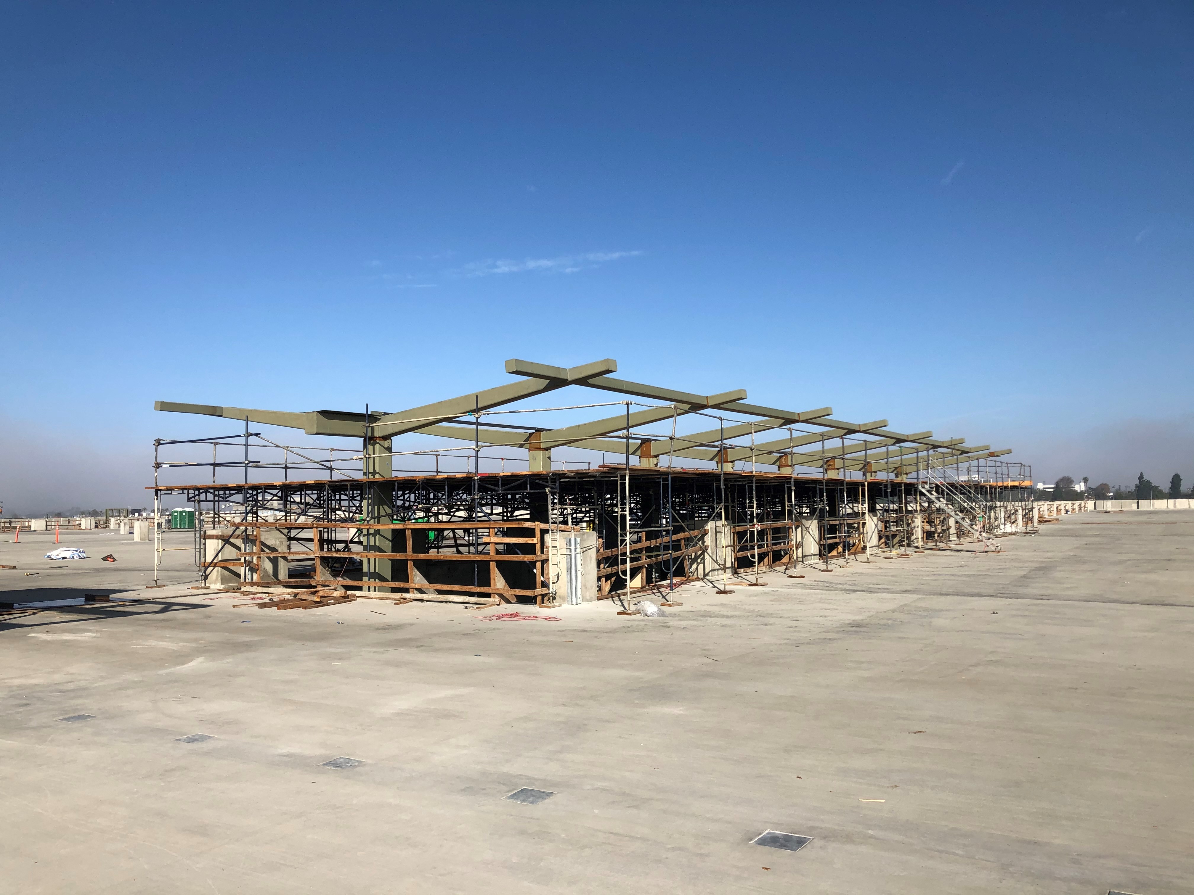 Installation of the escalator canopy on the roof of the Intermodal Transportation Facility-West.